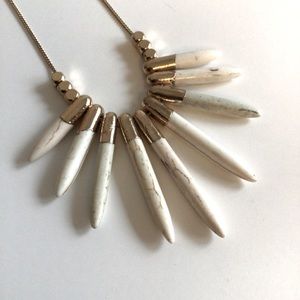 Gold and white necklace